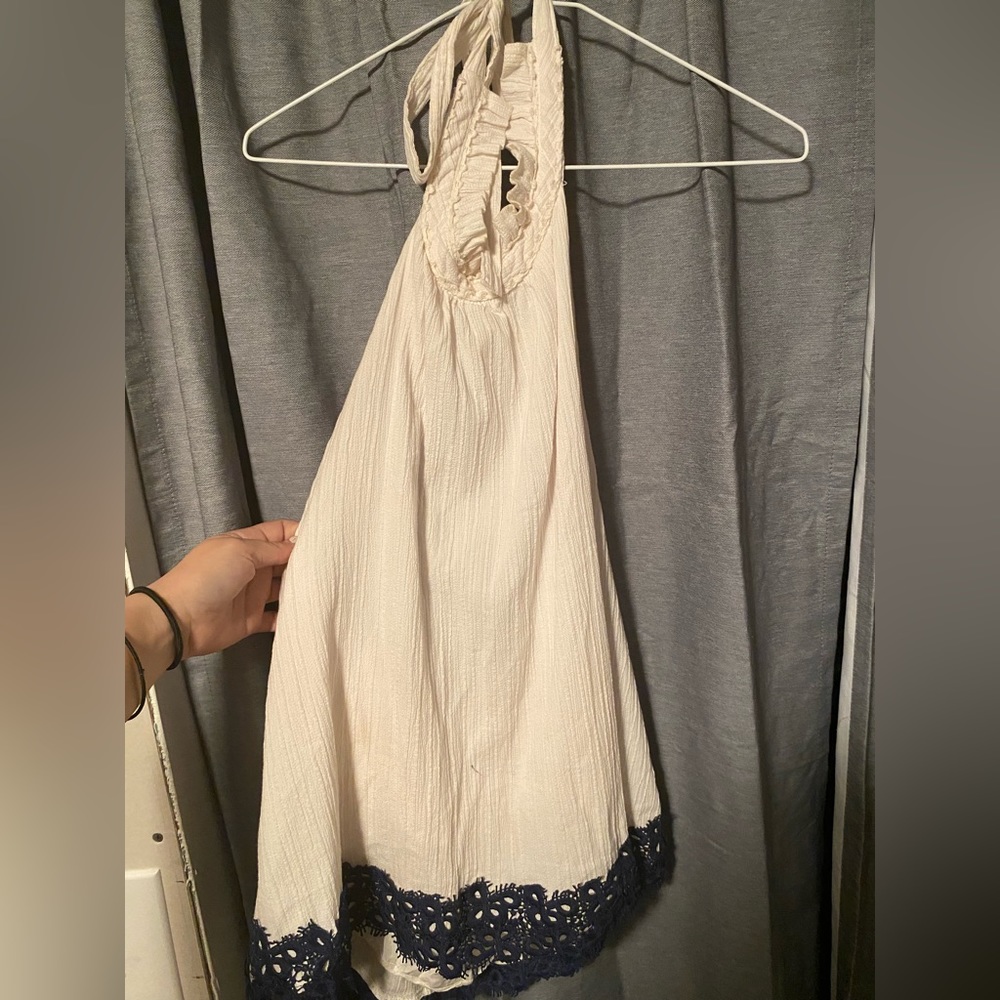 White and blue sleeveless blouse